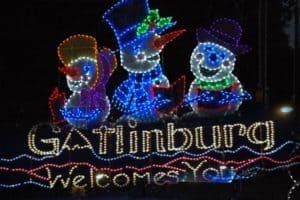 A Christmas lights display in the Smoky Mountains depicting caroling snowmen.
