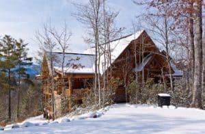 A beautiful Gatlinburg cabin covered in snow.