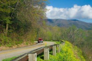 A car driving down Newfound Gap Road near Gatlinburg.