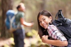 Happy couple hiking on their Smoky Mountain vacation.