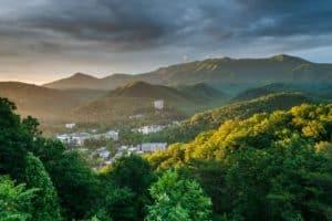 iew of downtown Gatlinburg in the mountains from one of our log cabin rentals in Gatlinburg Tennessee.