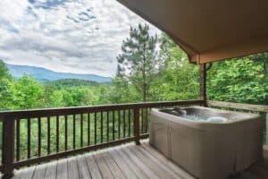 hot tub on porch of country bear hideaway